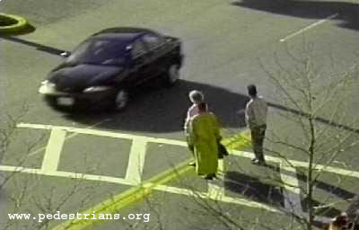 Photo - Drivers ignore pedestrians in crosswalk