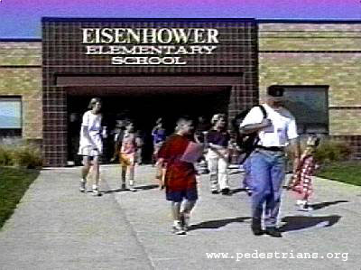 Photo : Children walking home from school with their parents