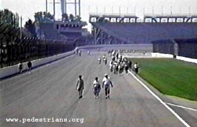 Photo - Walkers on the track of the Indianapolis Motor Speedway