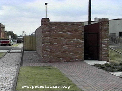 Photo - dumster enclosure blocks sidewalk