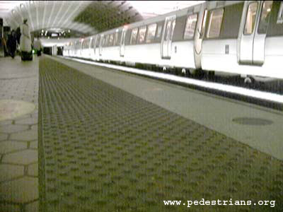 Change in surface textures near the Metro subway platform edge.