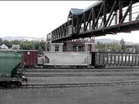 Pedestrian bridge across a rail yard.
