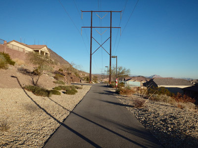 Paved trail under power lines.
