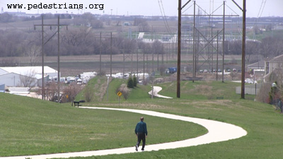 Trail with switchbacks under power lines.