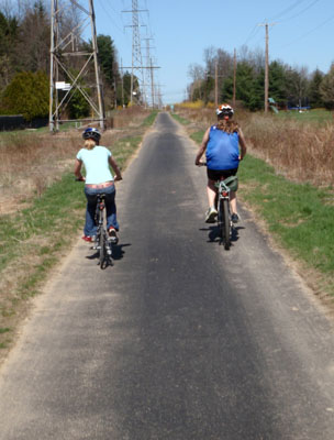 Bicyclists on Laura Ofelia Trolley Line Trail.