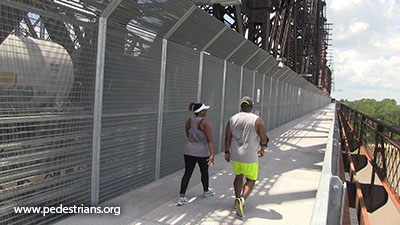 photo - pedestrians on  Memphis RR bridge walkway