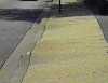 Photo - Driveway dips across sidewalk.